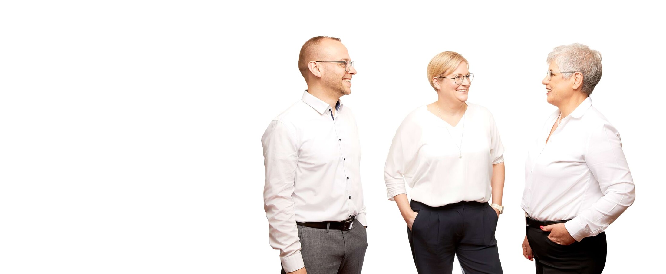 Frau Zimmermann-Brase, Frau Frank und Herr Pfefferle lachen zusammen